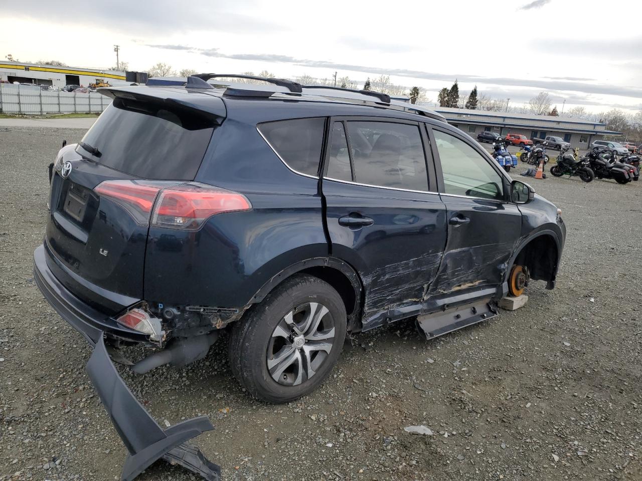 2017 Toyota RAV 4 VIN JTMZFREV1HJ709363 Copart auction photo, side / rear end damage thumbnail 3