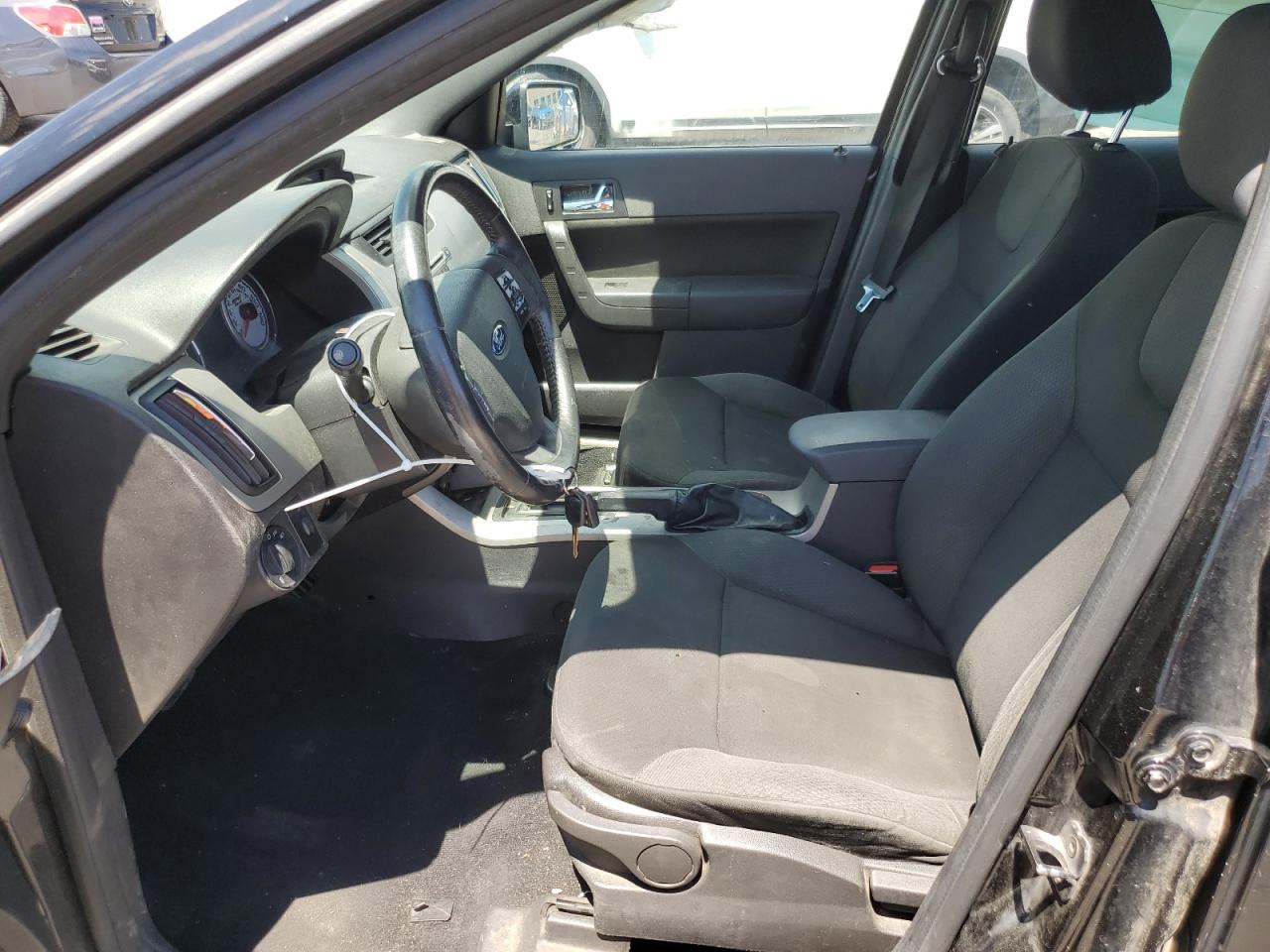 2009 Ford Focus VIN 1FAHP36N09W145560 Copart auction photo, side / mechanical damage thumbnail 7