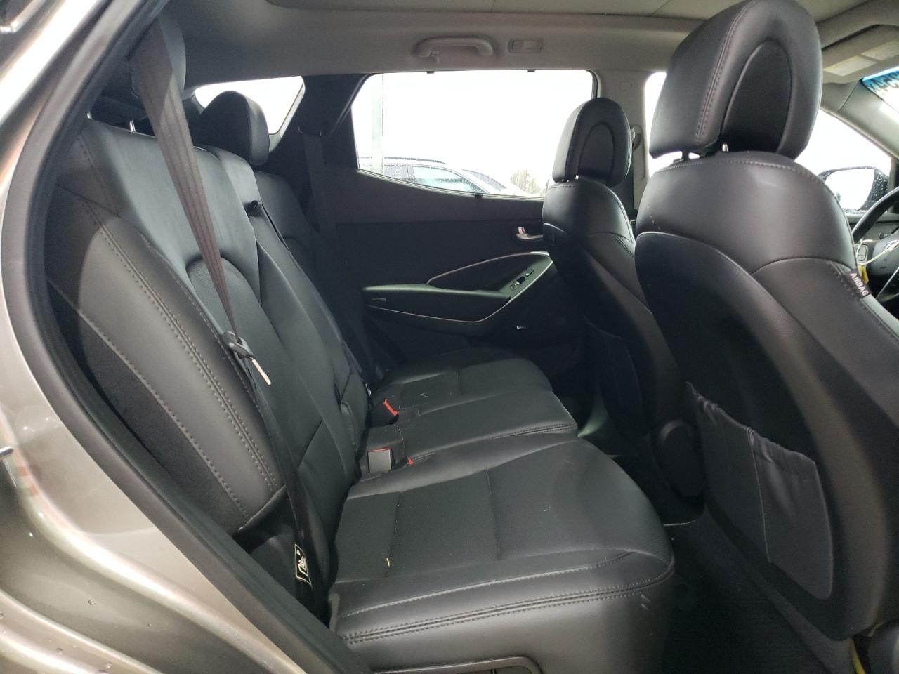 2017 Hyundai Santa Fe VIN 5XYZWDLA7HG446007 Copart auction photo, rear end / minor dent/scratches damage thumbnail 11