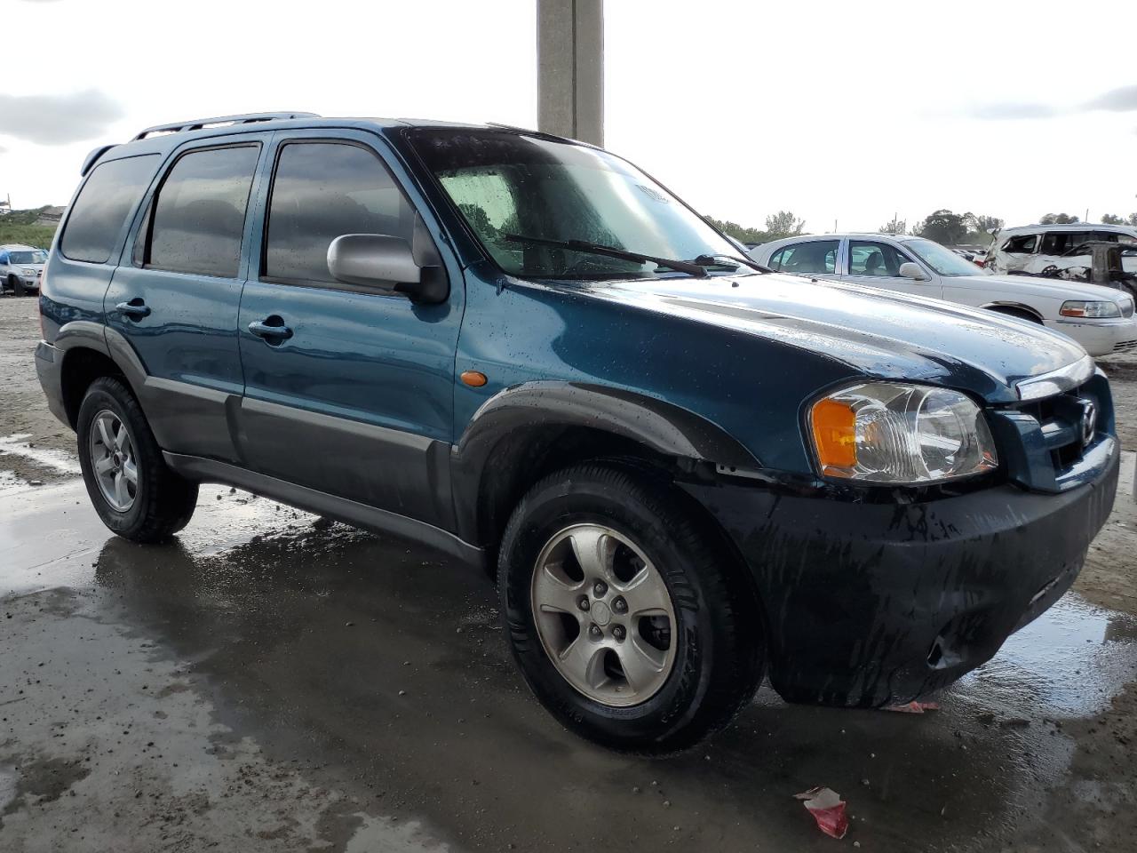 2005 Mazda Tribute VIN 4F2YZ06125KM05037 Copart auction photo, front end / minor dent/scratches damage thumbnail 4