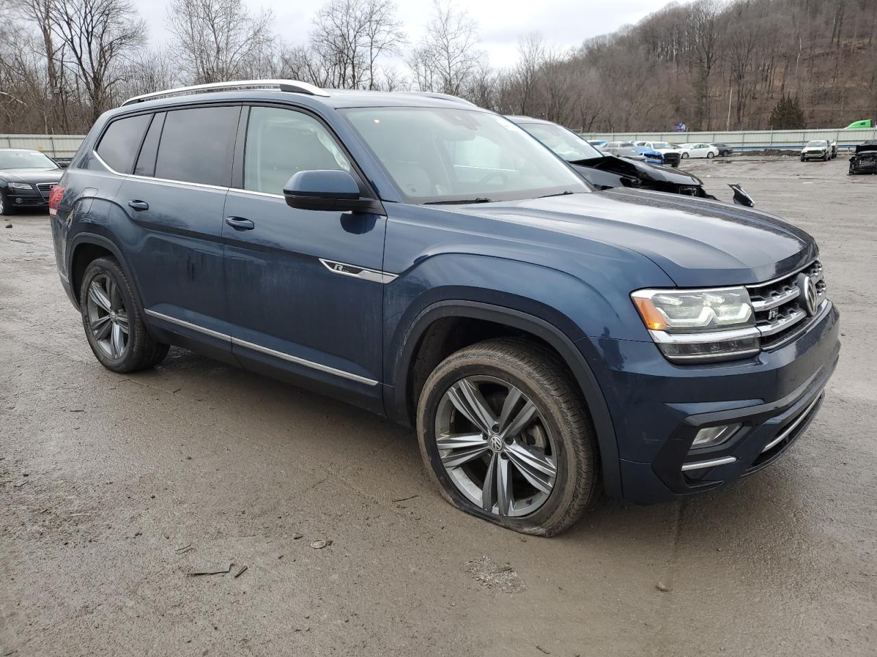 2019 Volkswagen Atlas VIN 1V2RR2CA0KC603673 Copart auction photo, rear end damage thumbnail 4
