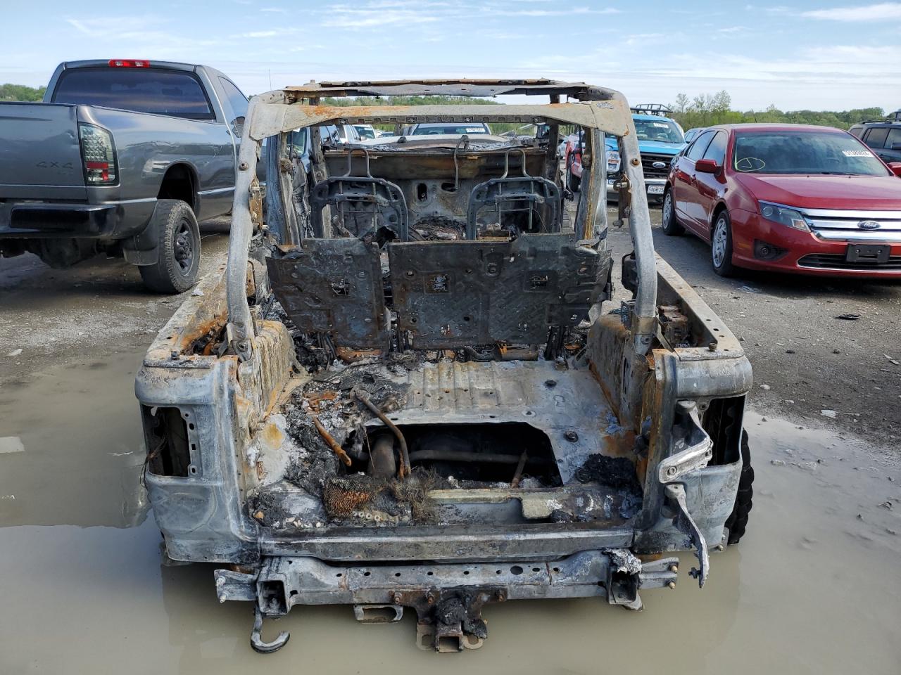 2020 Jeep Wrangler VIN 1C4HJXDN1LW182081 Copart auction photo, burn damage thumbnail 6