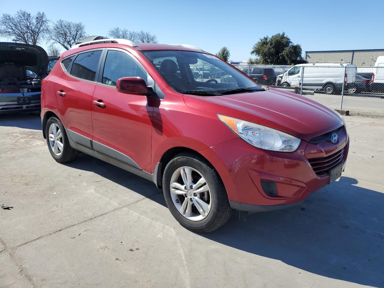 2011 Hyundai Tucson VIN KM8JU3AC2BU293426 Copart auction photo, side / front end damage thumbnail 4