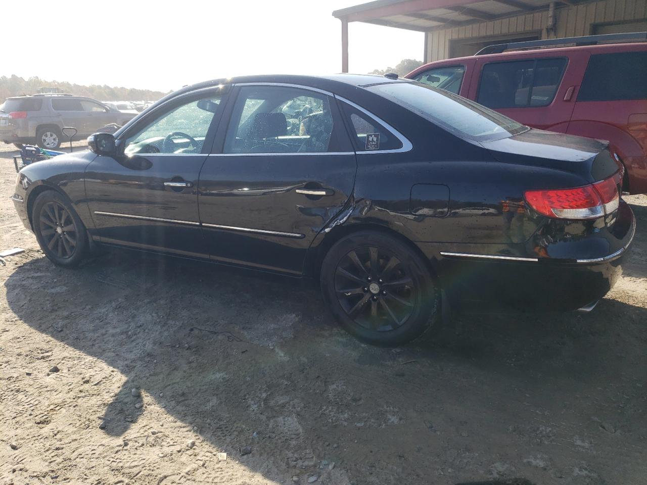 2010 Hyundai Azera VIN KMHFC4DF7AA450601 Copart auction photo, side / minor dent/scratches damage thumbnail 2