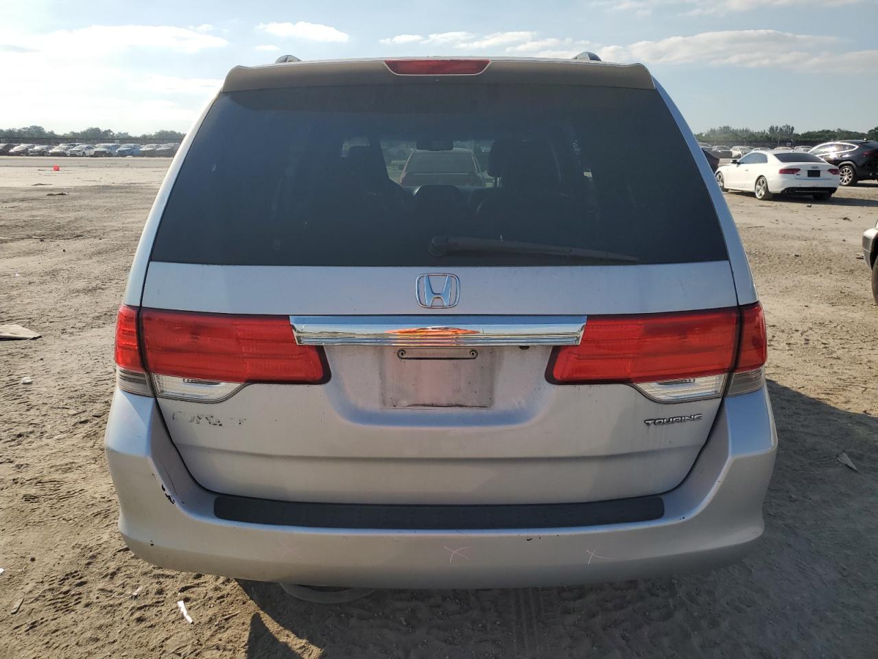 2010 Honda Odyssey VIN 5FNRL3H65AB024841 Copart auction photo, side / rear end damage thumbnail 6