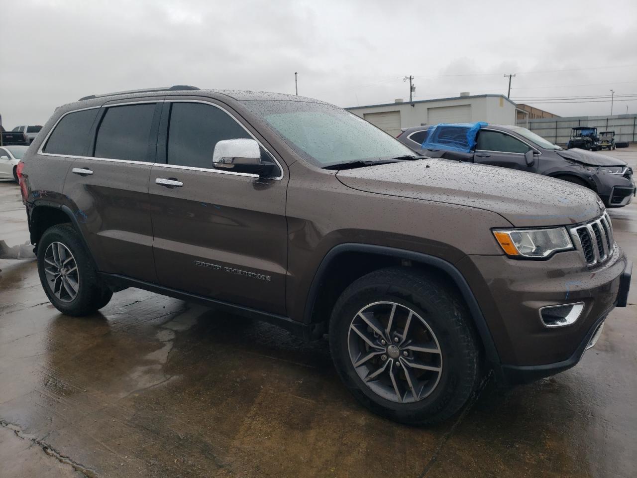 2017 Jeep Grand Cherokee VIN 1C4RJFBGXHC742272 Copart auction photo, rear end damage thumbnail 4