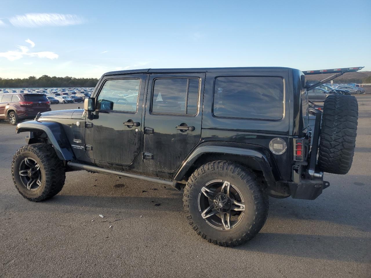 2014 Jeep Wrangler VIN 1C4HJWEG7EL265903 Copart auction photo, rear end / side damage thumbnail 2