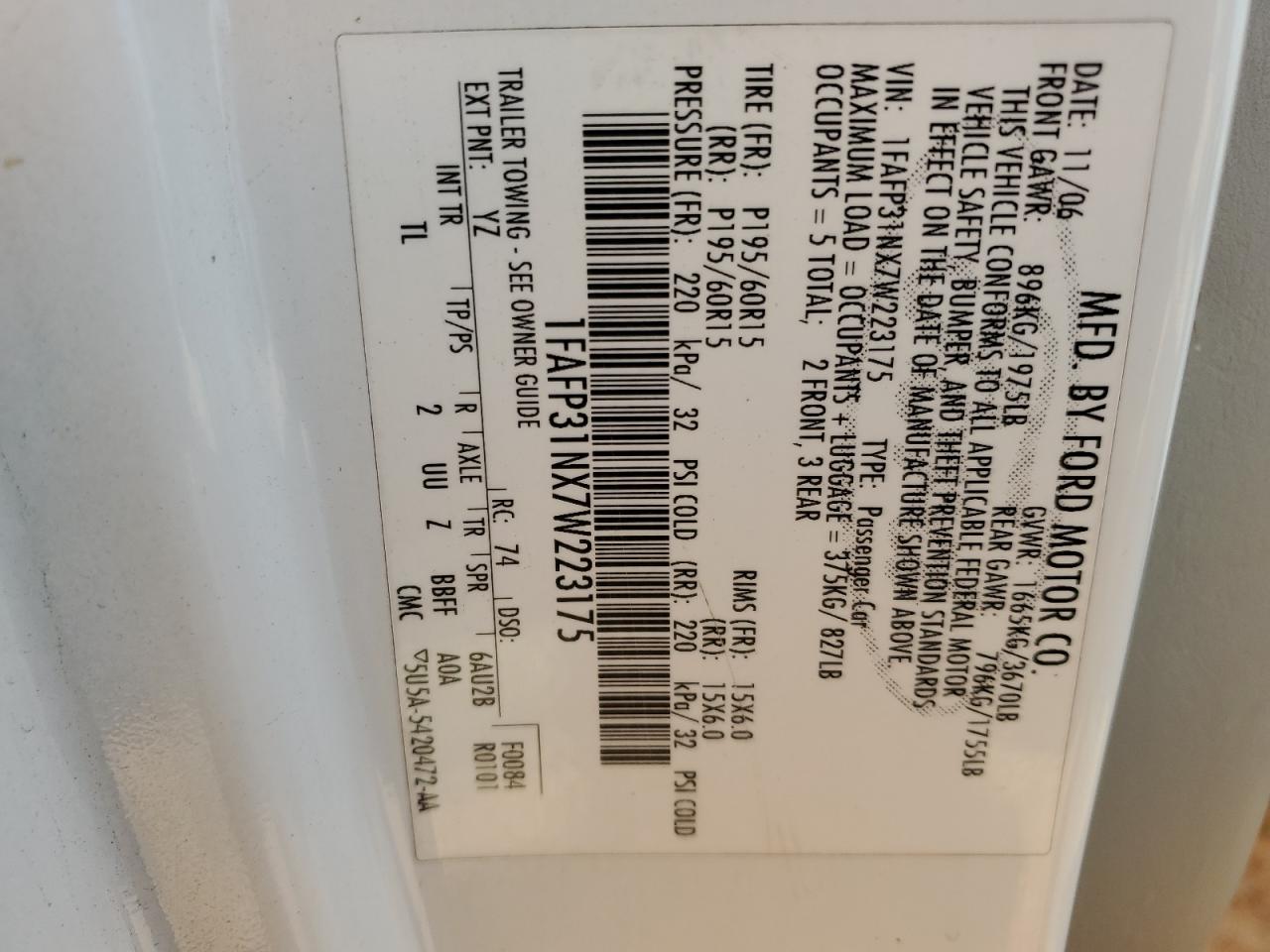 2007 Ford Focus VIN 1FAFP31NX7W223175 Copart auction photo, all over damage thumbnail 12