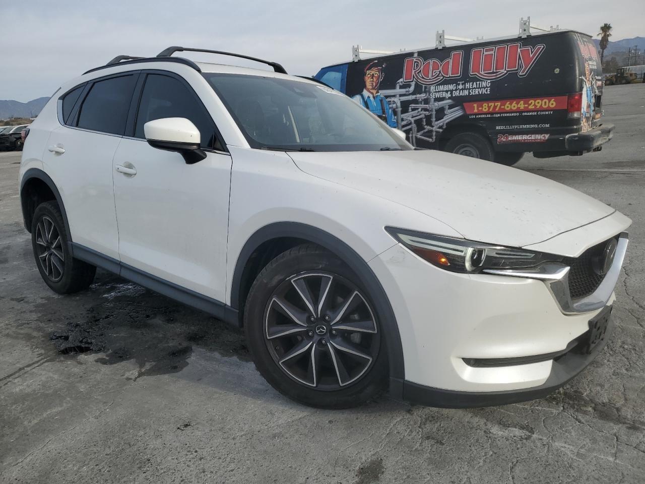 2017 Mazda CX-5 VIN JM3KFADL2H0131984 Copart auction photo, undercarriage / all over damage thumbnail 4