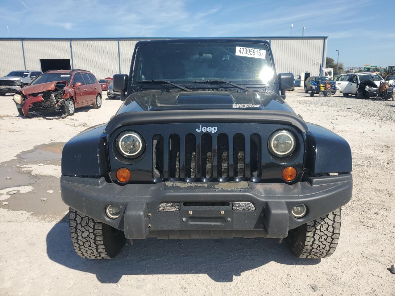 2012 Jeep Wrangler VIN 1C4BJWFG9CL198433 Copart auction photo, minor dent/scratches damage thumbnail 5