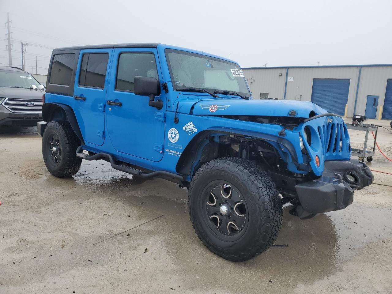 2011 Jeep Wrangler VIN 1J4BA3H11BL562182 Copart auction photo, front end / rear end damage thumbnail 4
