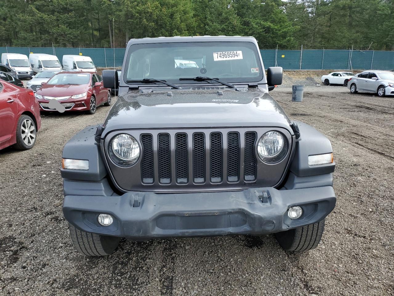 2021 Jeep Wrangler VIN 1C4HJXDNXMW779537 Copart auction photo, rear end / front end damage thumbnail 5