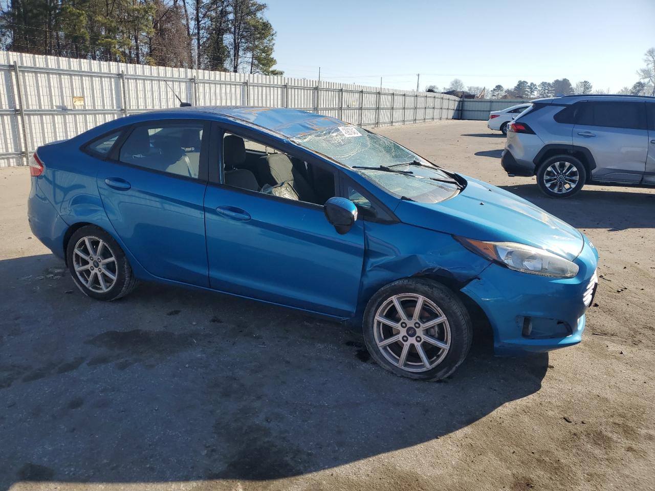 2016 Ford Fiesta VIN 3FADP4BJ4GM105423 Copart auction photo, rollover damage thumbnail 4