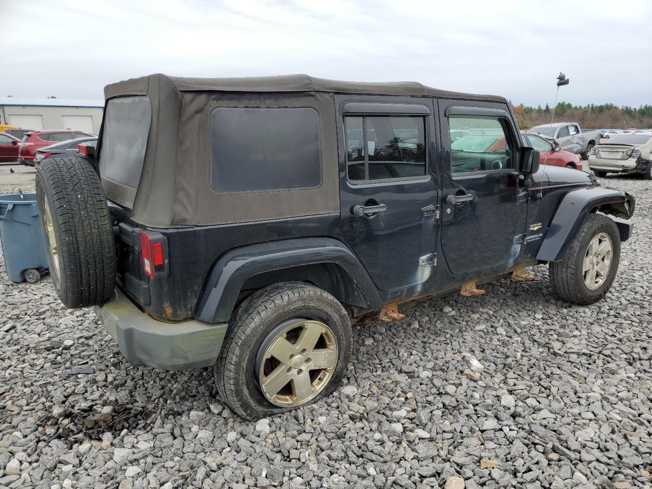 2009 Jeep Wrangler VIN 1J4GA59199L704322 Copart auction photo, front end / side damage thumbnail 3