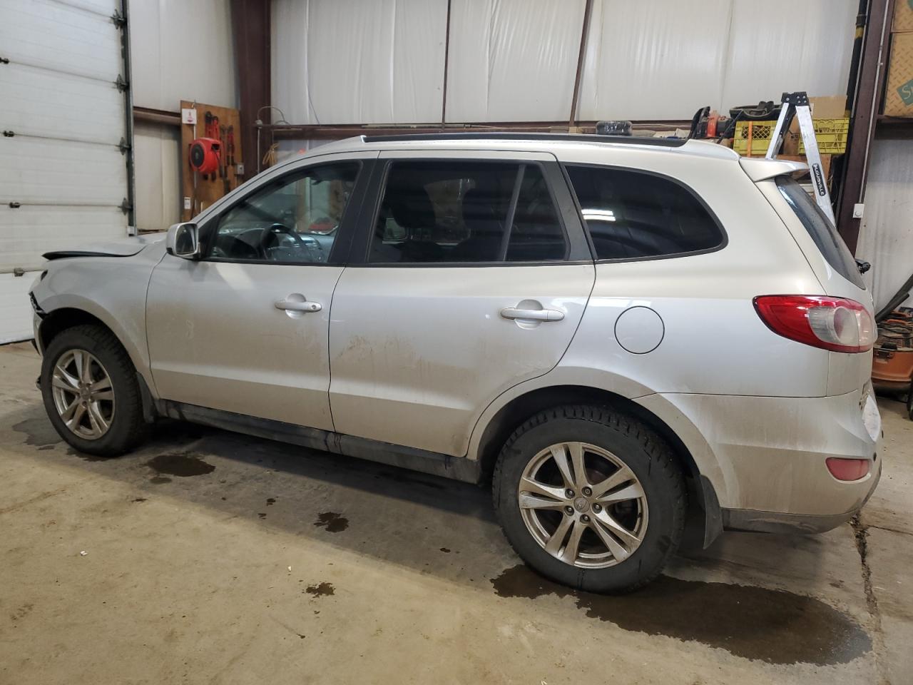 2012 Hyundai Santa Fe VIN 5XYZGDAG0CG143504 Copart auction photo, front end / side damage thumbnail 2