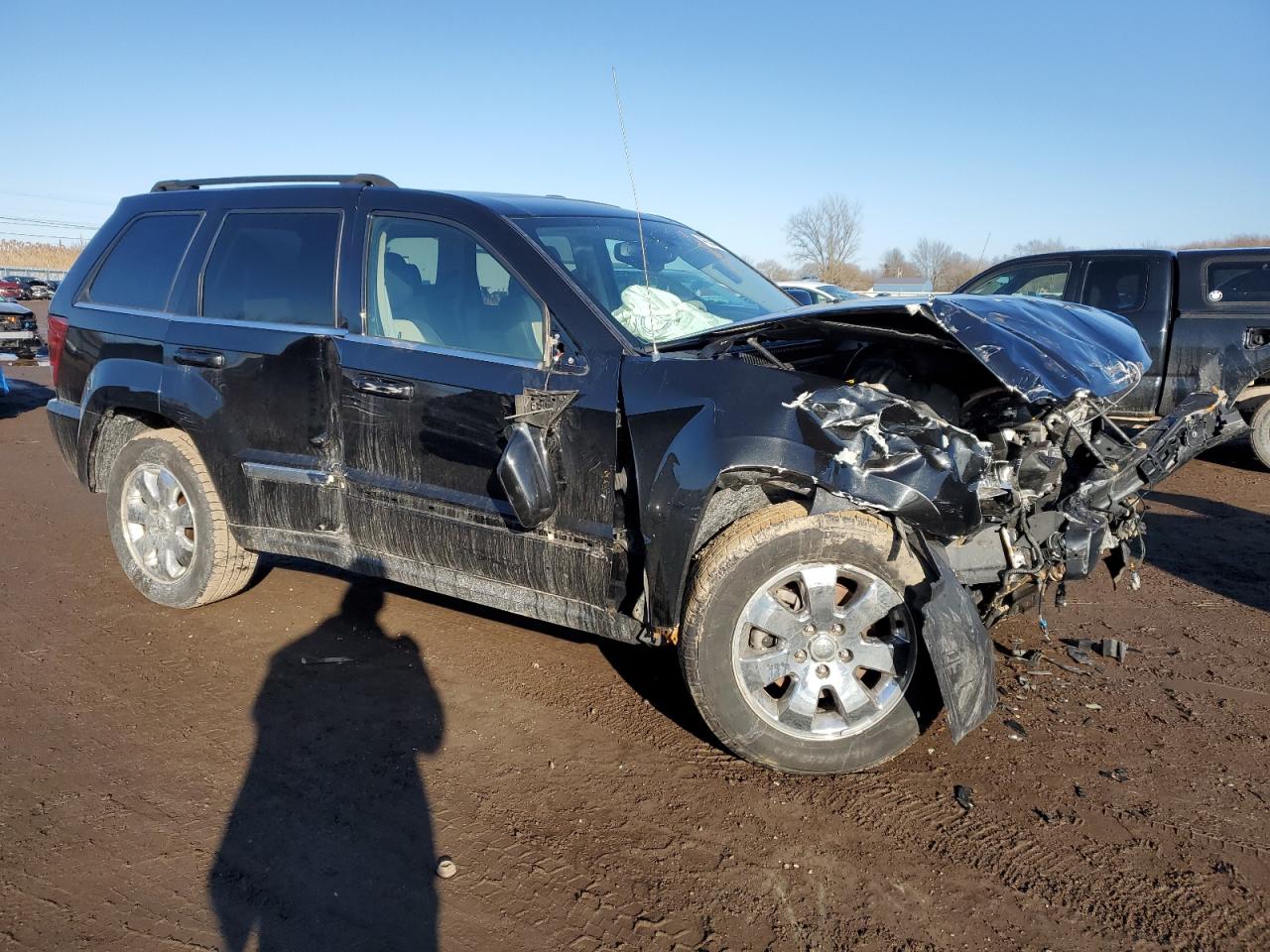 2009 Jeep Grand Cherokee VIN 1J8HR58P79C521857 Copart auction photo, front end / side damage thumbnail 4