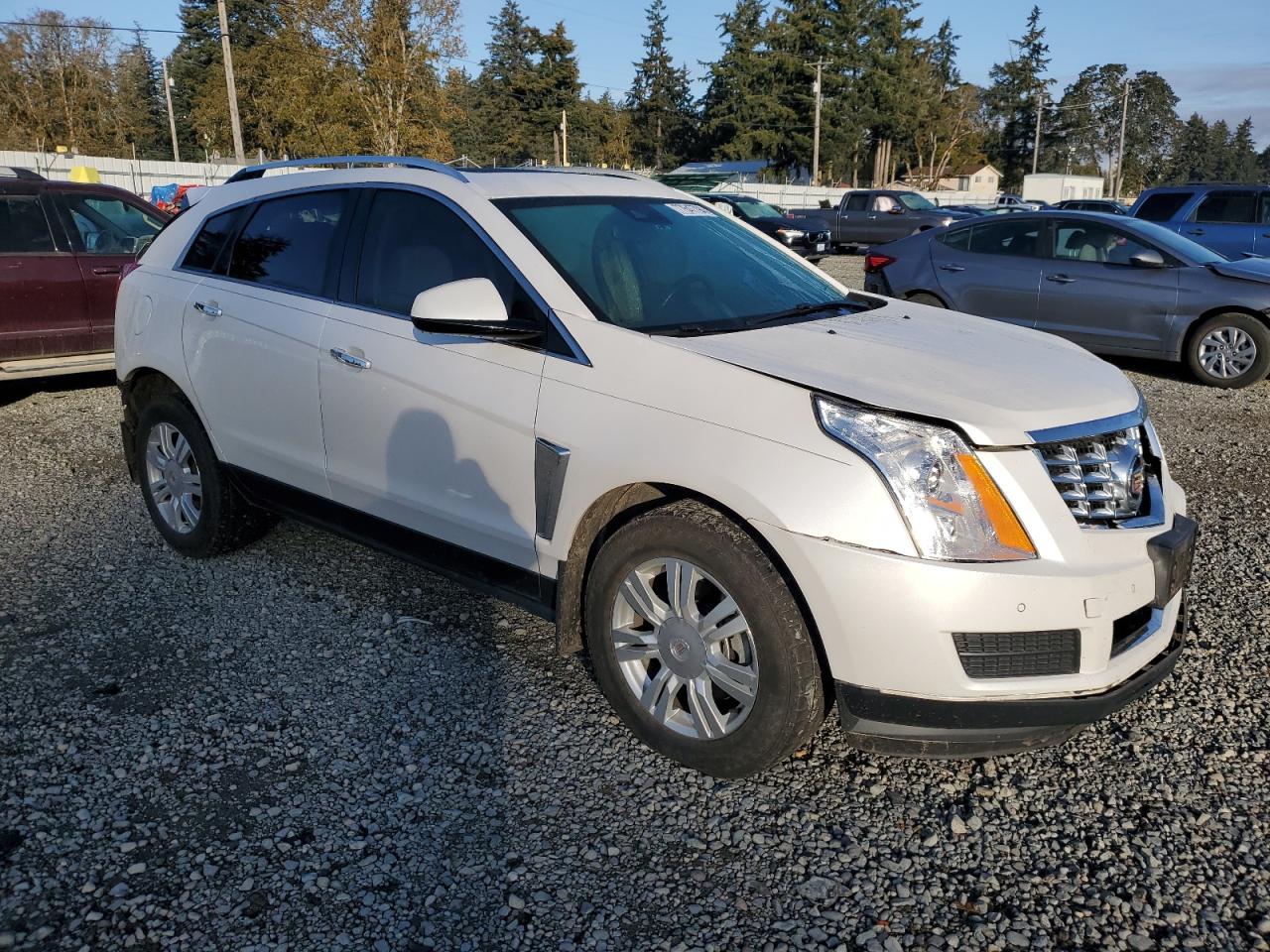2015 Cadillac SRX VIN 3GYFNBE31FS603853 Copart auction photo, rear end damage thumbnail 4