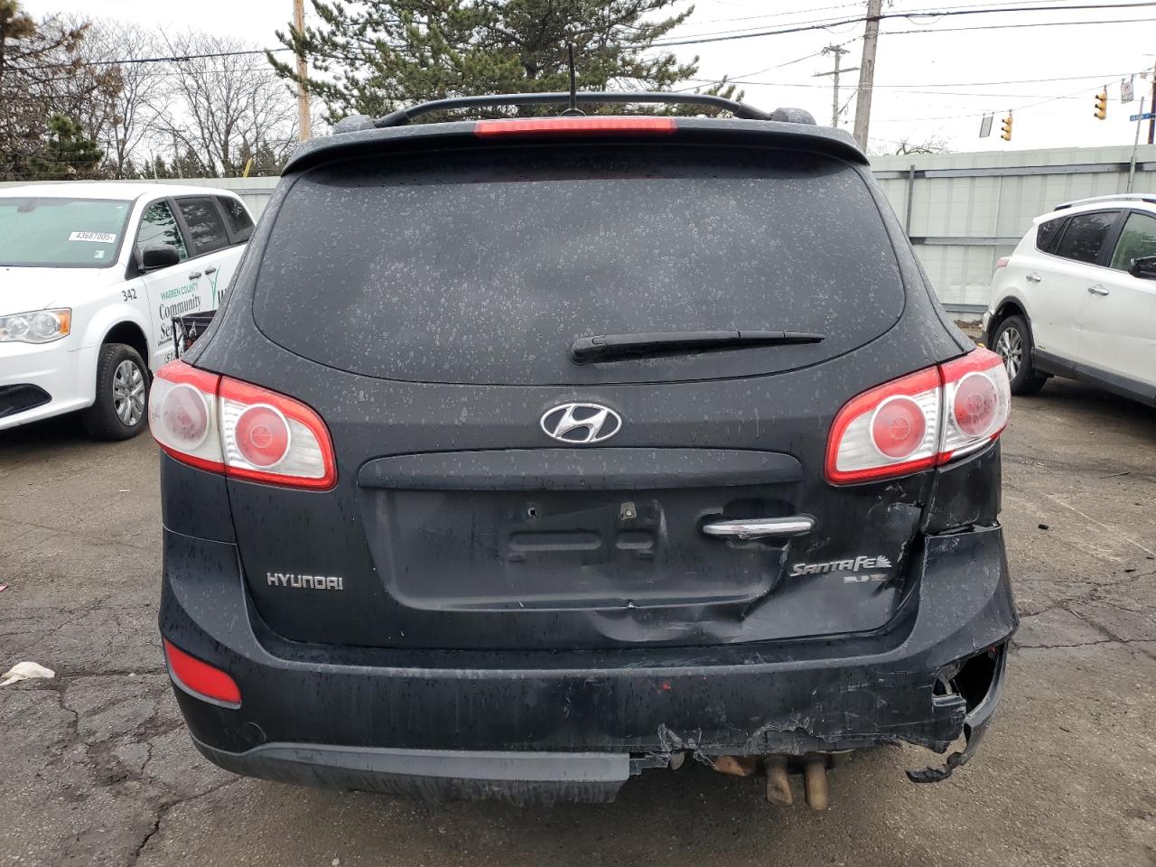 2011 Hyundai Santa Fe VIN 5XYZK3AB5BG090679 Copart auction photo, front end / rear end damage thumbnail 6