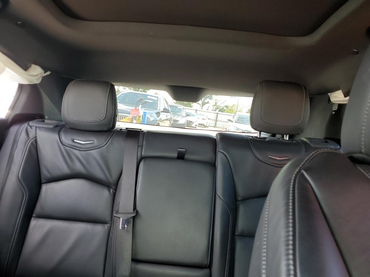 2020 Cadillac XT4 VIN 1GYFZCR40LF142125 Copart auction photo, all over damage thumbnail 10