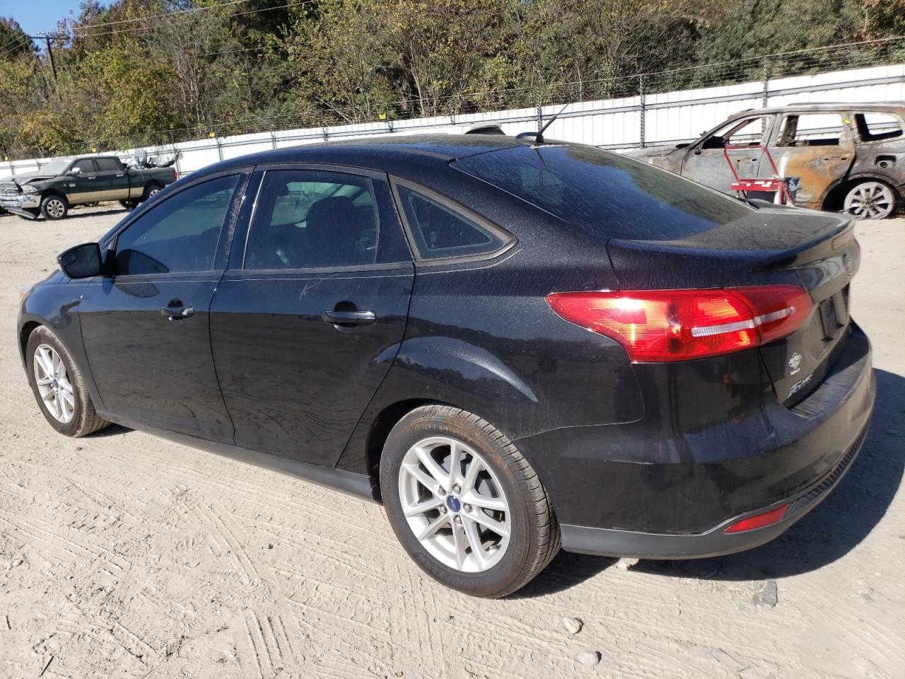 2015 Ford Focus VIN 1FADP3F29FL365846 Copart auction photo, minor dent/scratches damage thumbnail 2