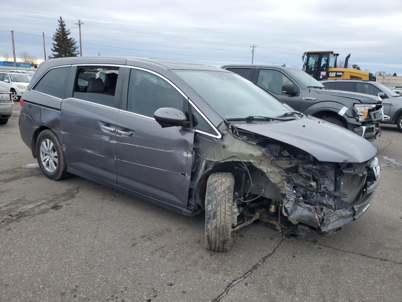 2015 Honda Odyssey VIN 5FNRL5H67FB048822 Copart auction photo, front end / side damage thumbnail 4
