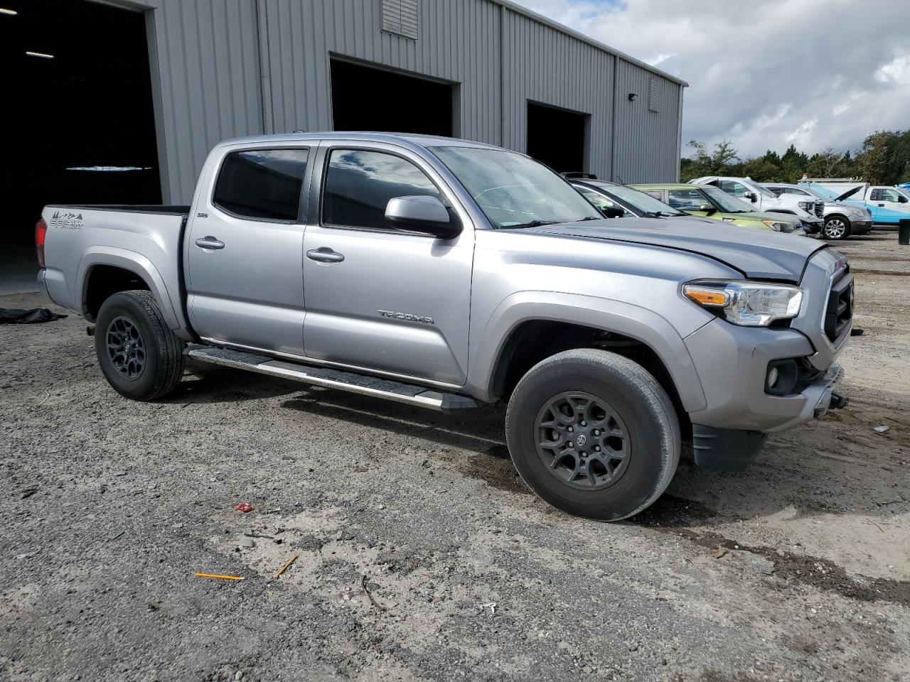 2020 Toyota Tacoma VIN 3TMAZ5CNXLM125751 Copart auction photo, front end / rear end damage thumbnail 4