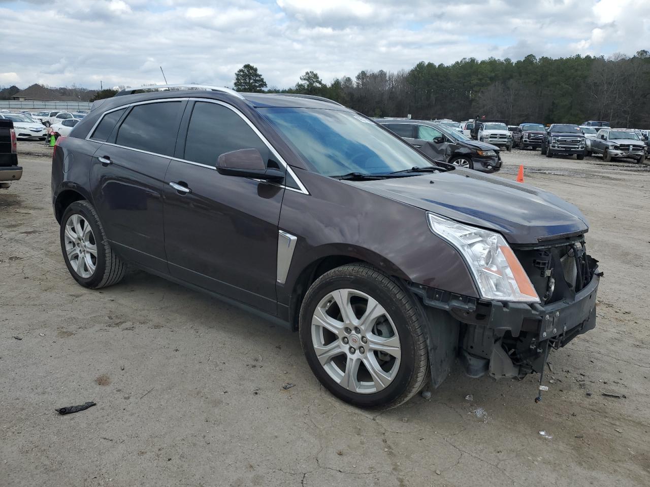 2016 Cadillac SRX VIN 3GYFNBE31GS566644 Copart auction photo, front end / side damage thumbnail 4