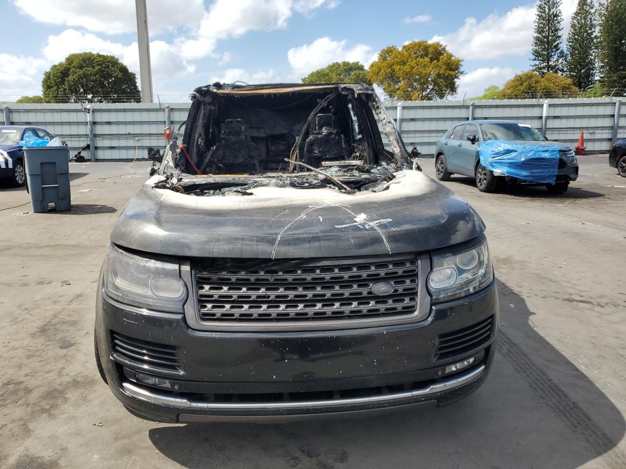 2015 Land Rover Range Rover VIN SALGV3TFXFA203717 Copart auction photo, burn damage thumbnail 5