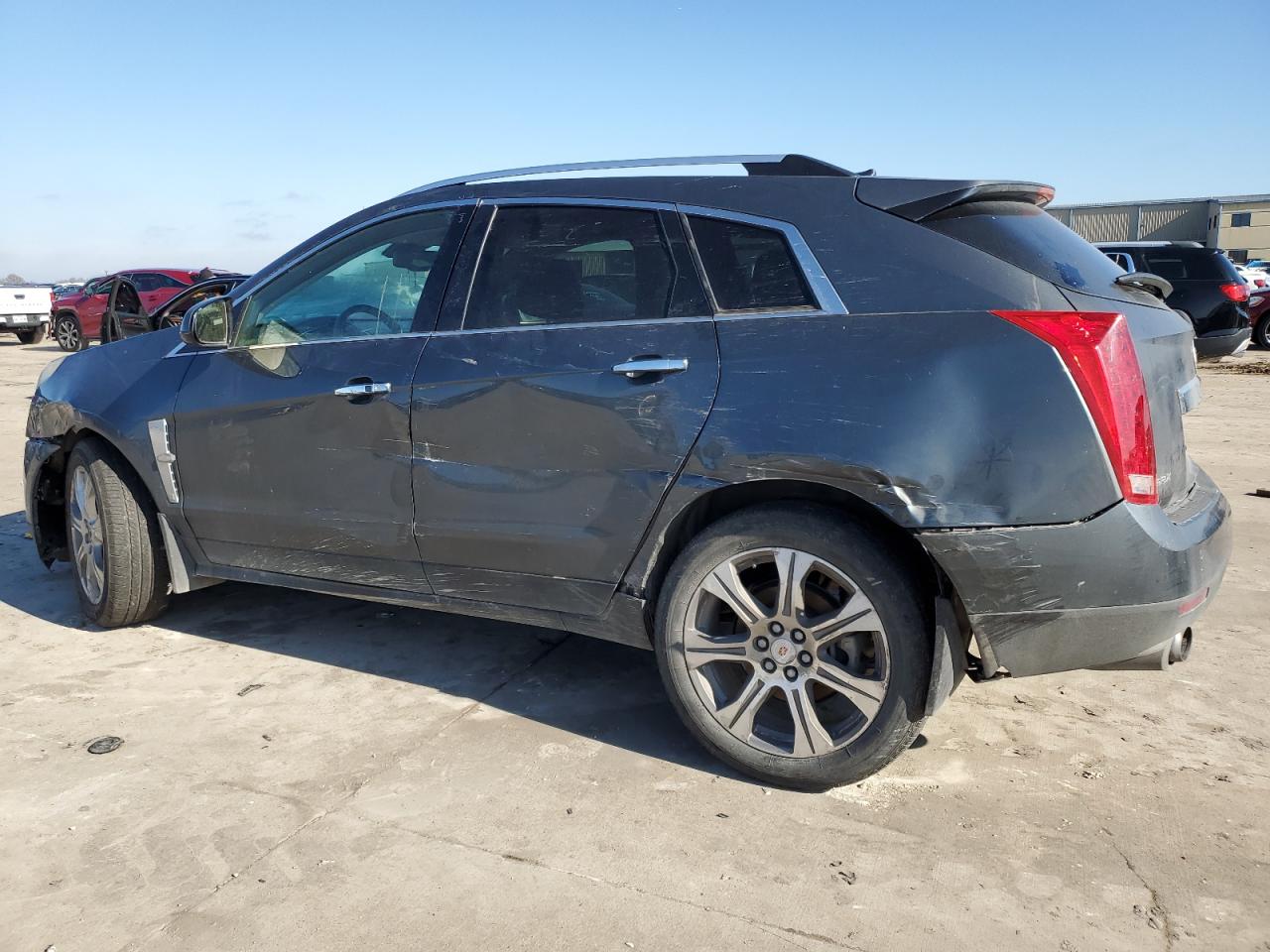 2012 Cadillac SRX VIN 3GYFNAE30CS543425 Copart auction photo, all over damage thumbnail 2