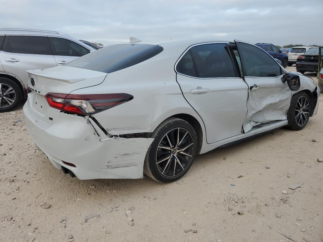 2023 Toyota Camry VIN 4T1G11AK3PU164679 Copart auction photo, side / minor dent/scratches damage thumbnail 3