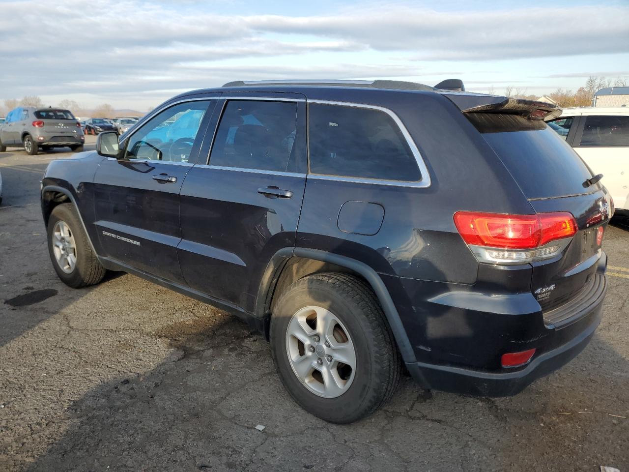 2015 Jeep Grand Cherokee VIN 1C4RJFAG4FC237083 Copart auction photo, side / front end damage thumbnail 2