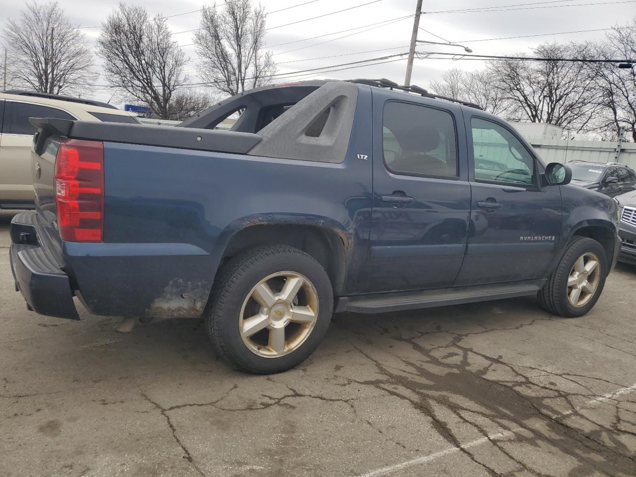2007 Chevrolet Avalanche VIN 3GNFK12327G233781 Copart auction photo, rear end damage thumbnail 3