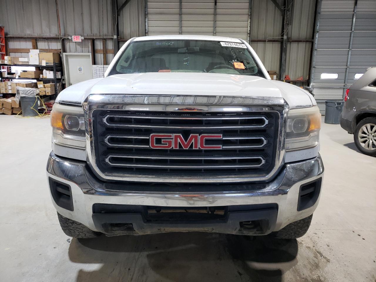 2015 GMC Sierra VIN 1GT12XEG0FF630197 Copart auction photo, rear end / side damage thumbnail 5