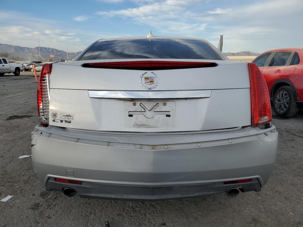 2010 Cadillac CTS VIN 1G6DJ5EV8A0102277 Copart auction photo, side / rear end damage thumbnail 6