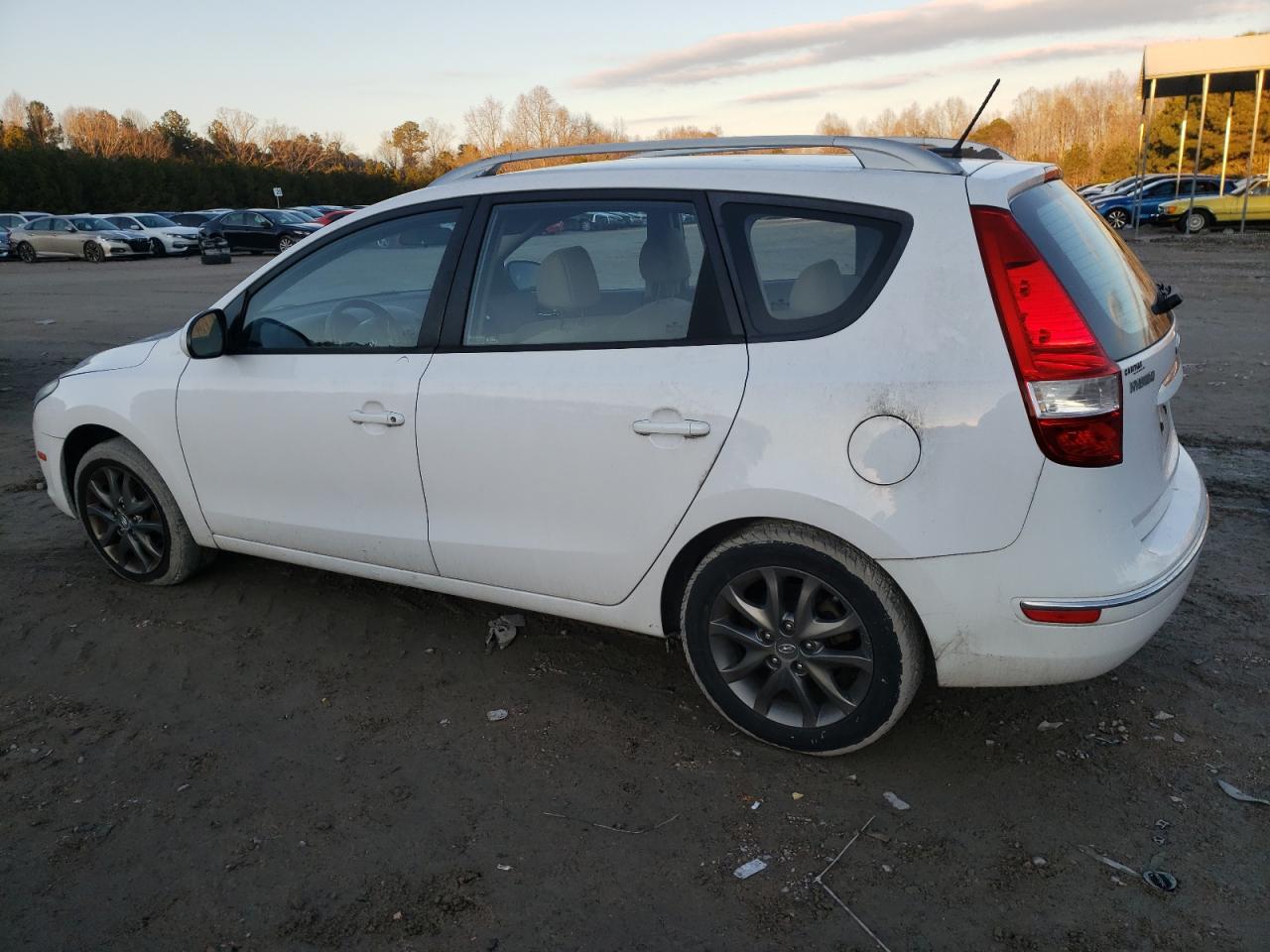 2012 Hyundai Elantra VIN KMHDC8AE6CU158434 Copart auction photo, front end / undercarriage damage thumbnail 2
