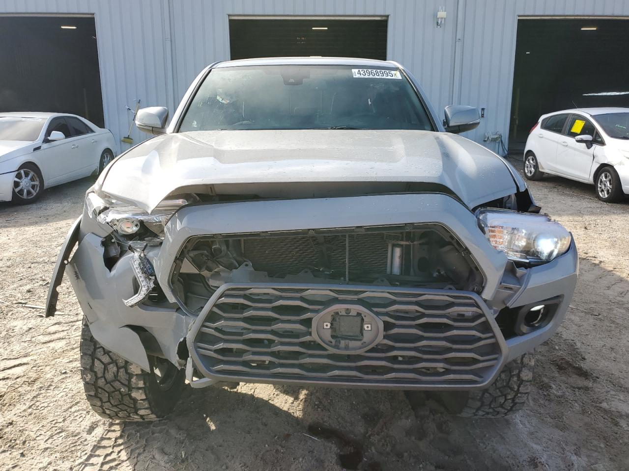2021 Toyota Tacoma VIN 3TMCZ5AN2MM396011 Copart auction photo, front end damage thumbnail 5