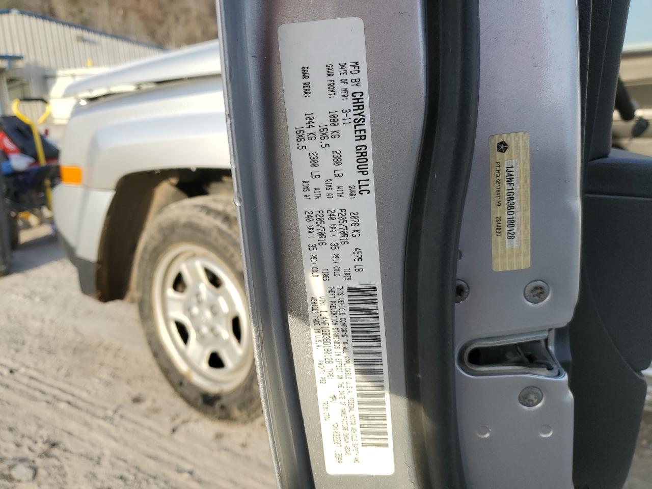 2011 Jeep Liberty (Patriot) VIN 1J4NF1GB3BD180128 Copart auction photo, all over damage thumbnail 13