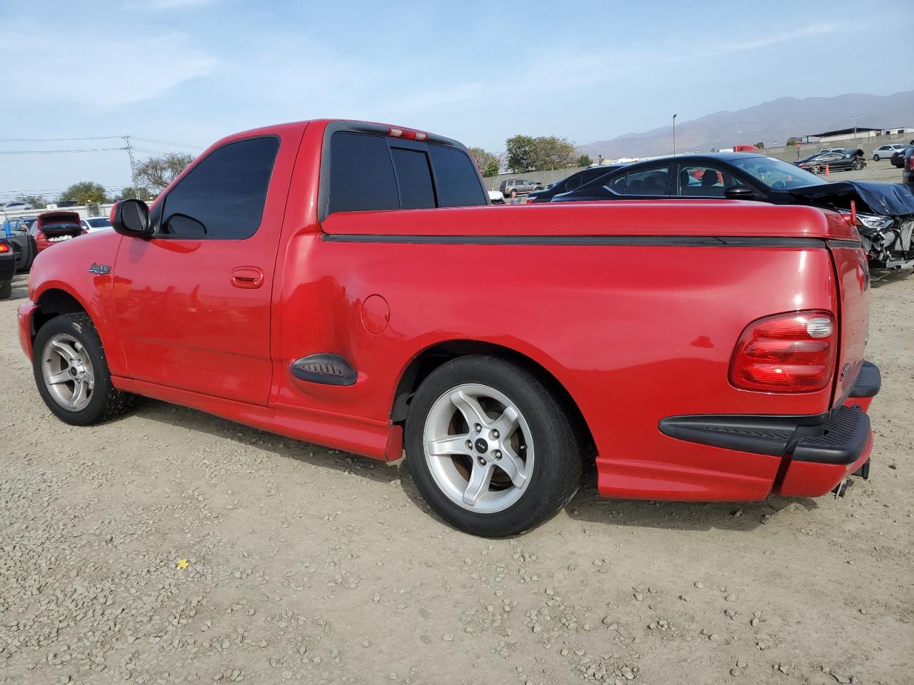 2000 Ford F-150 VIN 2FTZF0730YCA75551 Copart auction photo, rear end / side damage thumbnail 2