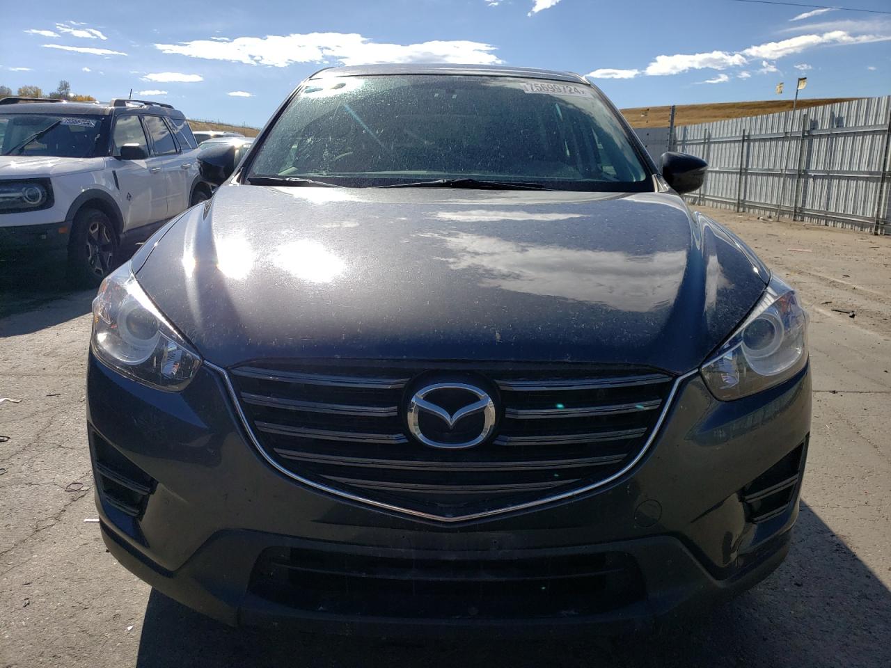 2016 Mazda CX-5 VIN JM3KE4BY9G0917587 Copart auction photo, rear end / side damage thumbnail 5