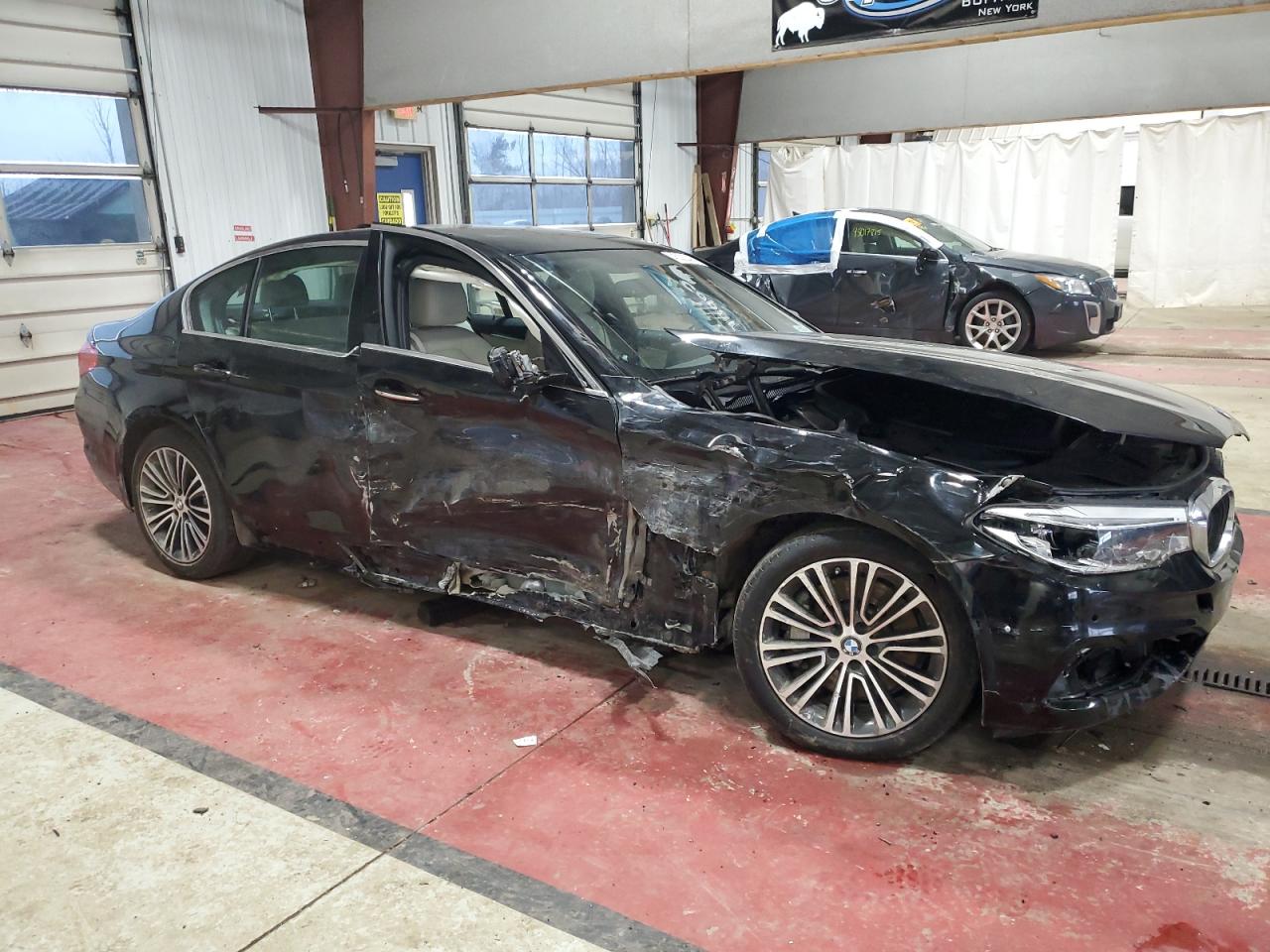 2017 BMW 5er VIN WBAJE7C36HG889956 Copart auction photo, undercarriage / all over damage thumbnail 4