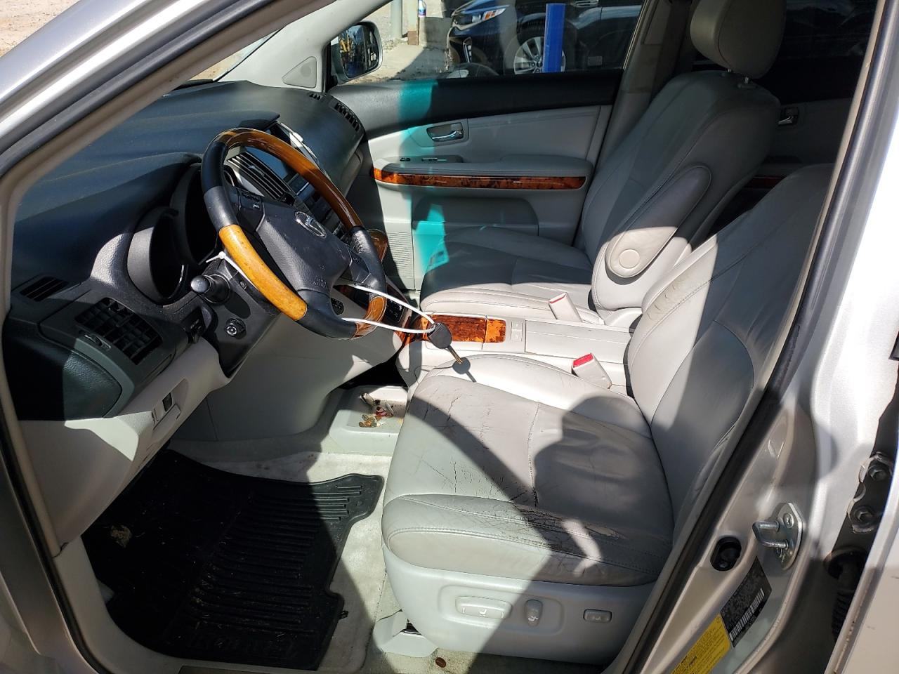 2009 Lexus RX VIN 2T2GK31UX9C062077 Copart auction photo, front end / side damage thumbnail 7