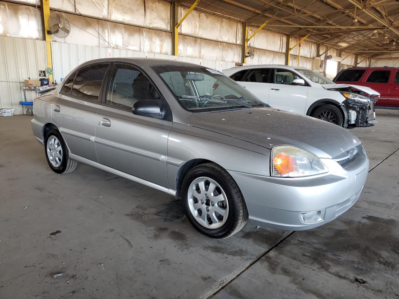 2004 KIA Rio VIN KNADC125746326479 Copart auction photo, front end / minor dent/scratches damage thumbnail 4