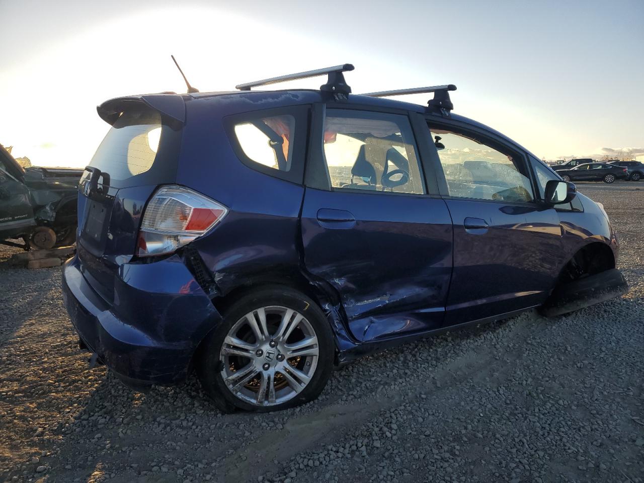 2010 Honda Fit VIN JHMGE8H46AS010137 Copart auction photo, all over damage thumbnail 3