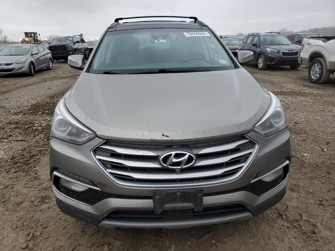 2018 Hyundai Santa Fe VIN 5XYZWDLA0JG558413 Copart auction photo, burn - engine damage thumbnail 5