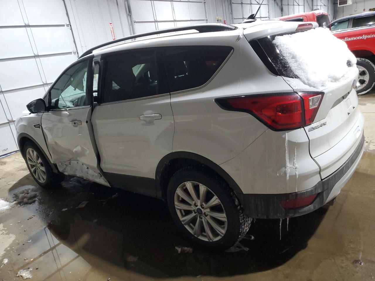 2019 Ford Escape VIN 1FMCU9HD8KUC42717 Copart auction photo, side / minor dent/scratches damage thumbnail 2