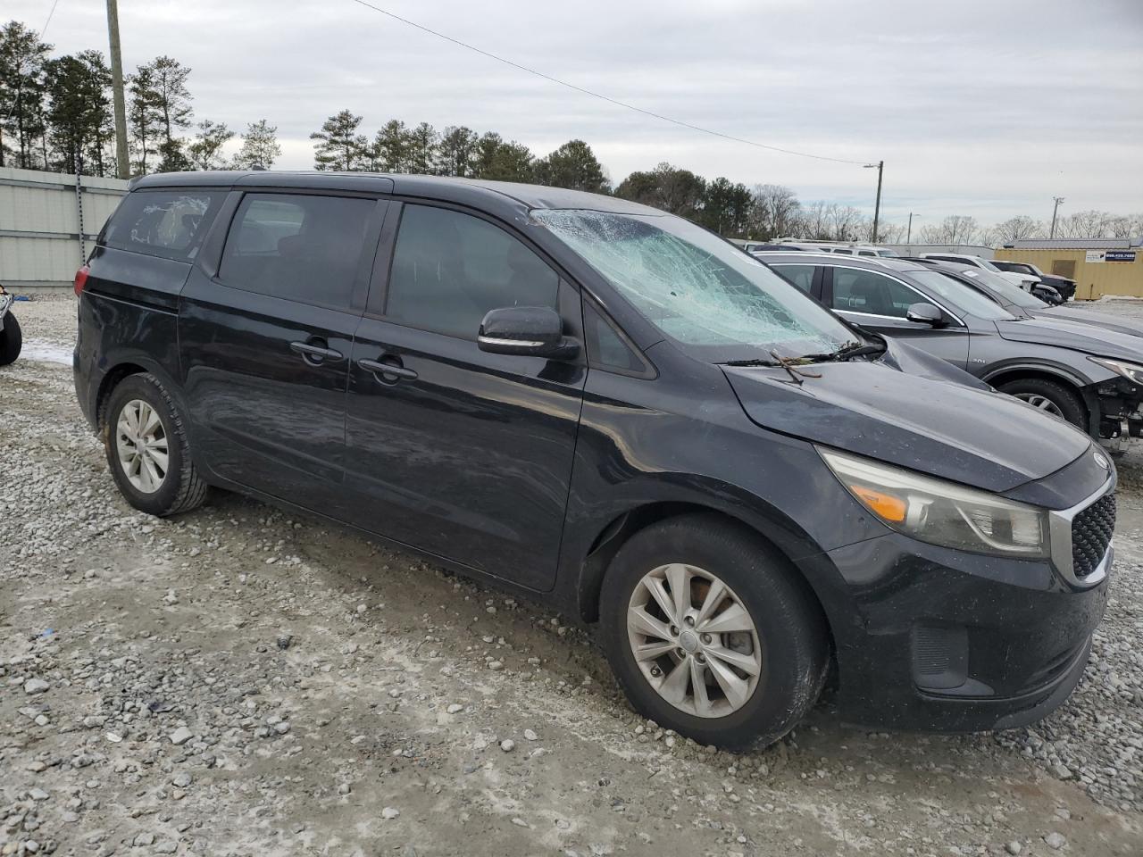 2016 KIA Sedona VIN KNDMA5C18G6168704 Copart auction photo, front end damage thumbnail 4