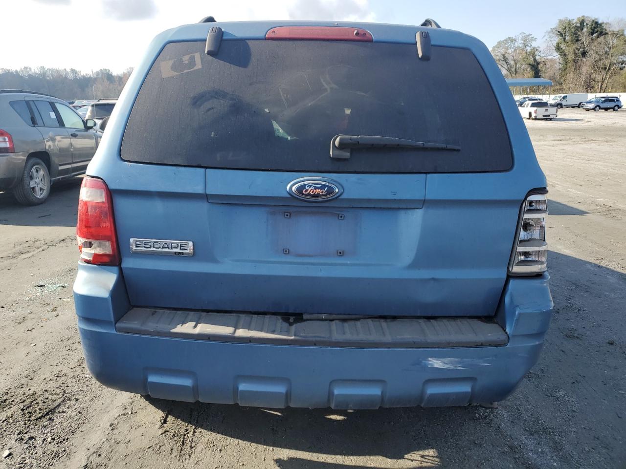 2009 Ford Escape VIN 1FMCU03G99KA51259 Copart auction photo, rollover damage thumbnail 6