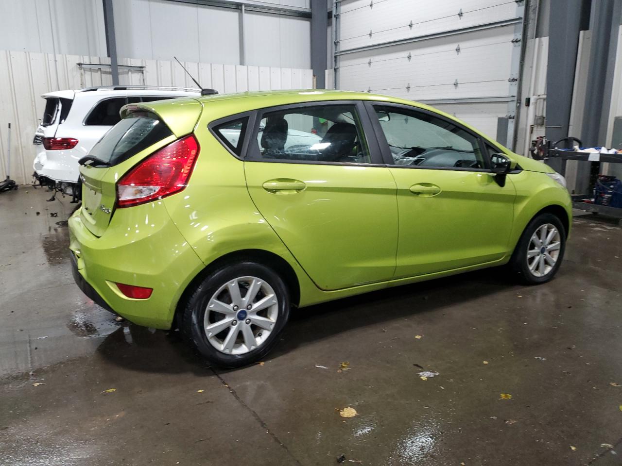 2012 Ford Fiesta VIN 3FADP4EJ3CM170768 Copart auction photo, rear end damage thumbnail 3