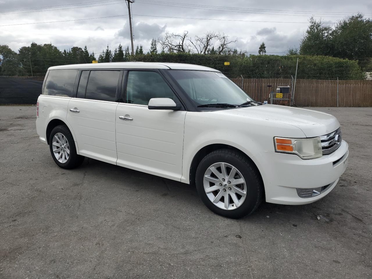 2009 Ford Flex VIN 2FMDK52C89BA77853 Copart auction photo, front end damage thumbnail 4