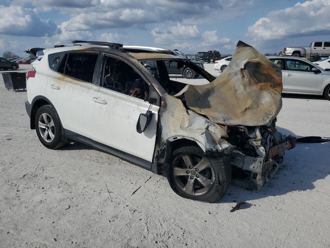 2015 Toyota RAV 4 VIN JTMRFREV4FJ045864 Copart auction photo, burn - engine / burn - interior damage thumbnail 4